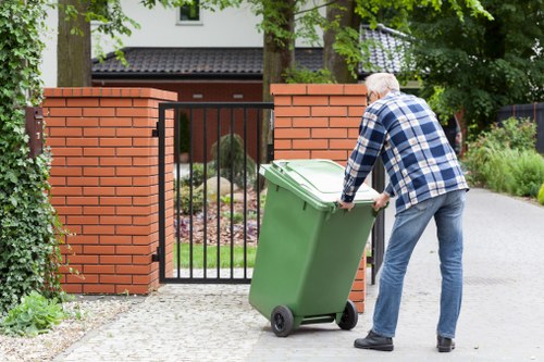 Businessperson reviewing billing details for commercial waste removal Bermondsey